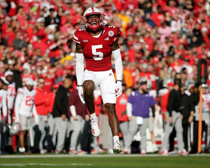 Nebraska Cornhuskers cornerback Cam Taylor-Britt (5) celebrates after successfully breaking up a pass intended for Ohio State Buckeyes wide receiver Chris Olave (2) during Saturday's NCAA Division I football game at Memorial Stadium in Lincoln, Neb., on November 6, 2021. Osu21neb Bjp 288