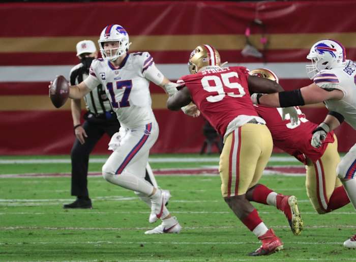 Buffalo quarterback Josh Allen (17) scrambles out of the pocket against 49ers defensive end Kentavius Street (95). Mandatory Credit: Michael Chow-Arizona Republic