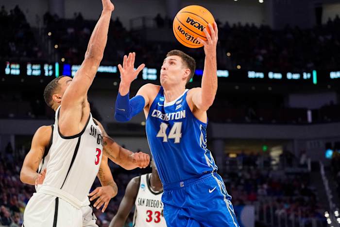 Mar 17, 2022; Fort Worth, TX, USA; Creighton Bluejays forward Ryan Hawkins (44) shoots over San Diego State Aztecs guard Matt Bradley (3) during the second half in the first round of the 2022 NCAA Tournament at Dickies Arena. Mandatory Credit: Chris Jones-USA TODAY Sports