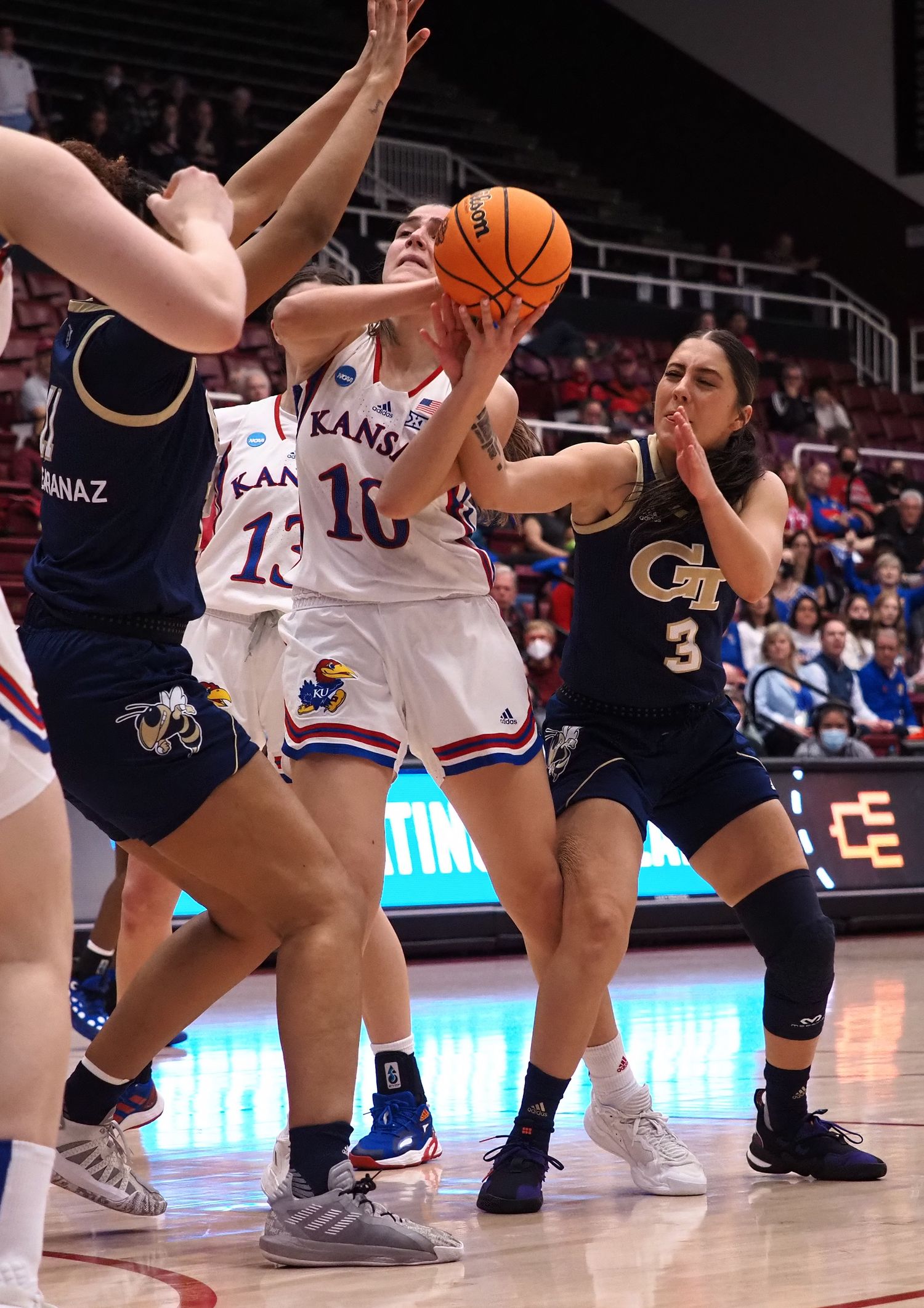 Mar 18, 2022; Stanford, California, USA; Kansas Jayhawks forward Ioanna Chatzileonti (10) is fouled by Georgia Tech Yellow Jackets guard Sarah Bates (3) during the first quarter at Maples Pavilion. Mandatory Credit: Kelley L Cox-USA TODAY Sports