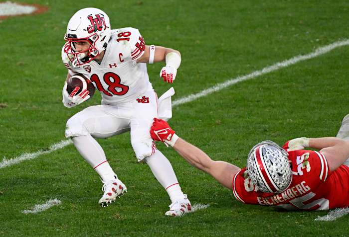 Utah Utes wide receiver Britain Covey (18) breaks away from Ohio State Buckeyes linebacker Tommy Eichenberg (35) during the third quarter of the 2022 Rose Bowl at Rose Bowl. Mandatory Credit: Robert Hanashiro-USA TODAY Sports.