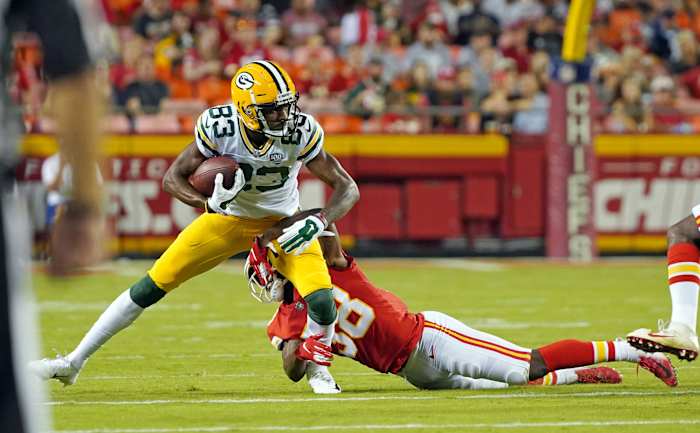 Aug 30, 2018; Kansas City, MO, USA; Green Bay Packers wide receiver Marquez Valdes-Scantling (83) runs against Kansas City Chiefs defensive back Arrion Springs (38) in the first half at Arrowhead Stadium. Mandatory Credit: Jay Biggerstaff-USA TODAY Sports