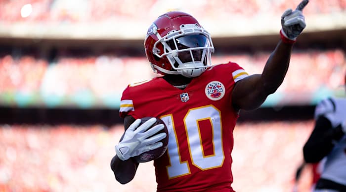 Chiefs star Tyreek Hill points.