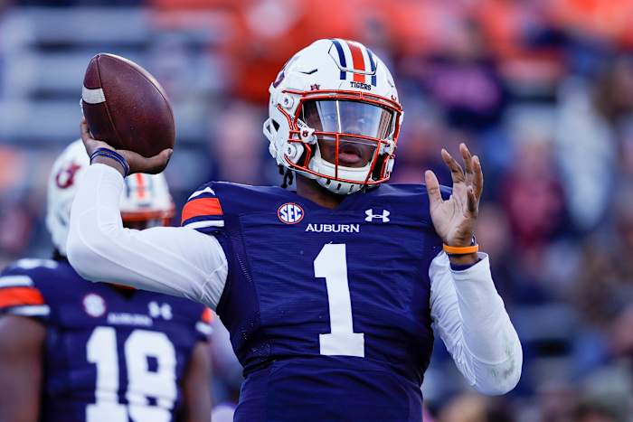 Auburn quarterback TJ Finley (1) warms up before the start of an NCAA college football game against Alabama Saturday, Nov. 27, 2021, in Auburn, Ala. (AP Photo/Butch Dill)