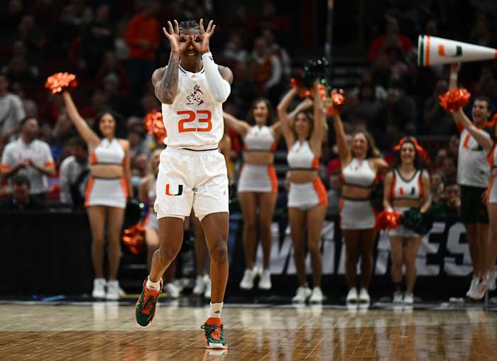 Mar 25, 2022; Chicago, IL, USA; Miami (Fl) Hurricanes guard Kameron McGusty (23) reacts after a three point basket during the first half against the Iowa State Cyclones in the semifinals of the Midwest regional of the men's college basketball NCAA Tournament at United Center.