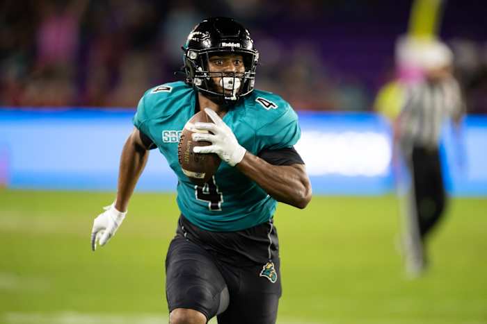 Dec 17, 2021; Orlando, Florida, USA; Coastal Carolina Chanticleers tight end Isaiah Likely (4) runs with the ball during the second half against the Northern Illinois Huskies during the 2021 Cure Bowl at Exploria Stadium. Mandatory Credit: Matt Pendleton-USA TODAY Sports
