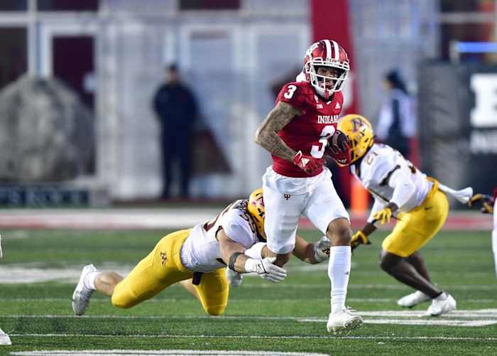 Nov 20, 2021; Bloomington, Indiana, USA; Indiana Hoosiers wide receiver Ty Fryfogle (3) is tackled by Minnesota Golden Gophers linebacker Mariano Sori-Marin (55) during the second half at Memorial Stadium. Gophers won 35-14. Mandatory Credit: Marc Lebryk-USA TODAY Sports