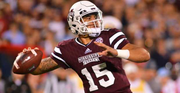 Mississippi State Bulldogs quarterback Dak Prescott attempts a pass during a college football game in the SEC.