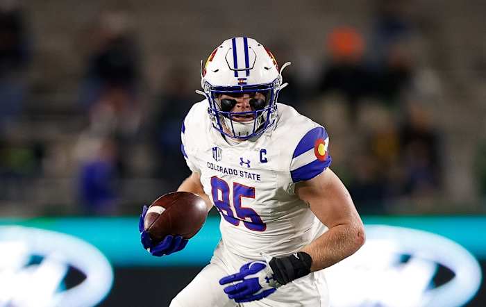 Nov 27, 2021; Fort Collins, Colorado, USA; Colorado State Rams tight end Trey McBride (85) runs the ball on a reception in the second quarter against the Nevada Wolf Pack at Sonny Lubrick Field at Canvas Stadium. Mandatory Credit: Isaiah J. Downing-USA TODAY Sports