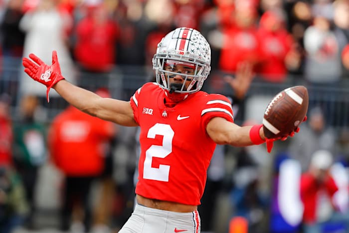 Nov 20, 2021; Columbus, Ohio, USA; Ohio State Buckeyes wide receiver Chris Olave (2) celebrates his touchdown during the first quarter against the Michigan State Spartans at Ohio Stadium. Mandatory Credit: Joseph Maiorana-USA TODAY Sports