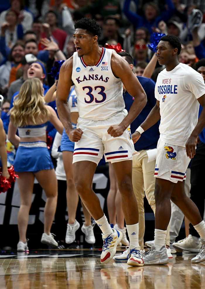 Mar 27, 2022; Chicago, IL, USA; Kansas Jayhawks forward David McCormack (33) celebrates after a play during the second half against the Miami Hurricanes in the finals of the Midwest regional of the men's college basketball NCAA Tournament at United Center. Mandatory Credit: Jamie Sabau-USA TODAY Sports