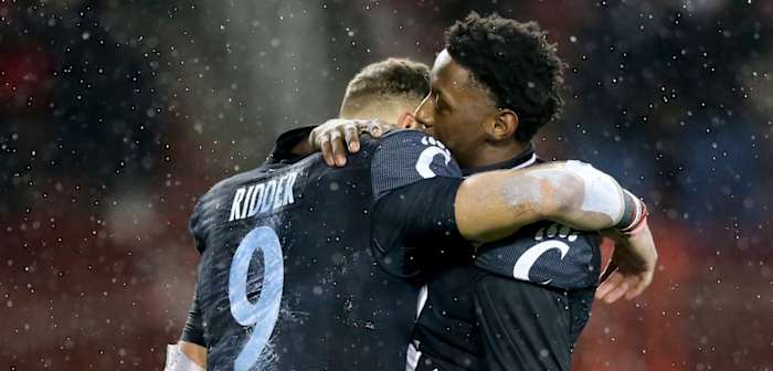 Cincinnati Bearcats quarterback Desmond Ridder (9) and Cincinnati Bearcats cornerback Ahmad Gardner (12) hug after winning the American Athletic Conference championship football game against the Tulsa Golden Hurricane, Saturday, Dec. 19, 2020, at Nippert Stadium in Cincinnati. The Cincinnati Bearcats won, 27-24. Aac Championship Tulsa Golden Hurricane At Cincinnati Bearcats Football Dec 19