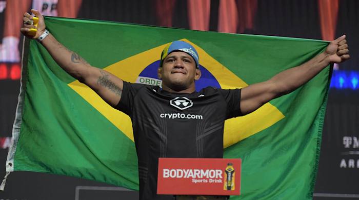 Gilbert Burns reacts during weigh ins for UFC 264 at T-Mobile Arena.