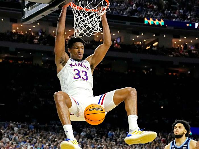 Kansas Jayhawks forward David McCormack (33) dunks the ball against dunks the ball against Villanova Wildcats