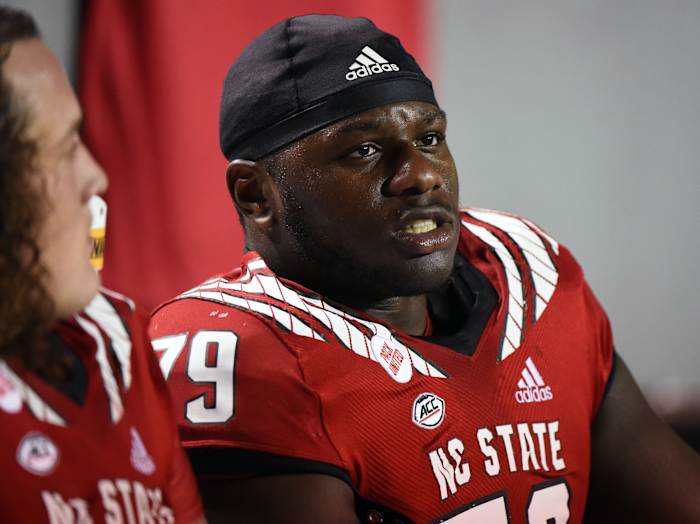 NC State OT Ikem Ekwonu sits on sideline