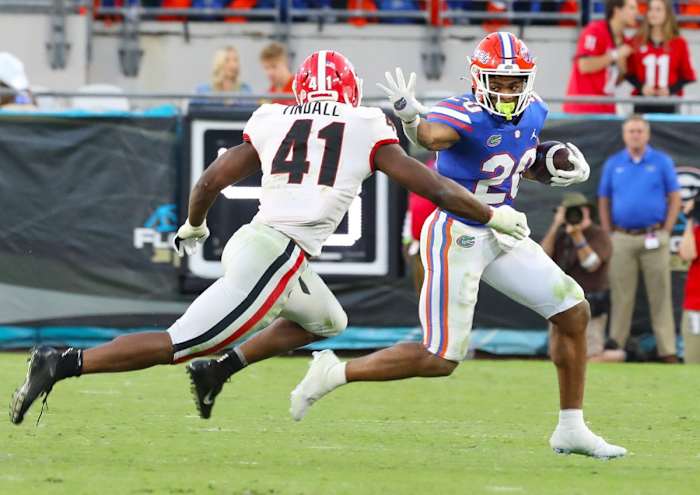 Georgia Bulldogs linebacker Channing Tindall (41) runs down Florida running back Malik Davis. Brad McClenny/The Gainesville Sun / USA TODAY NETWORK