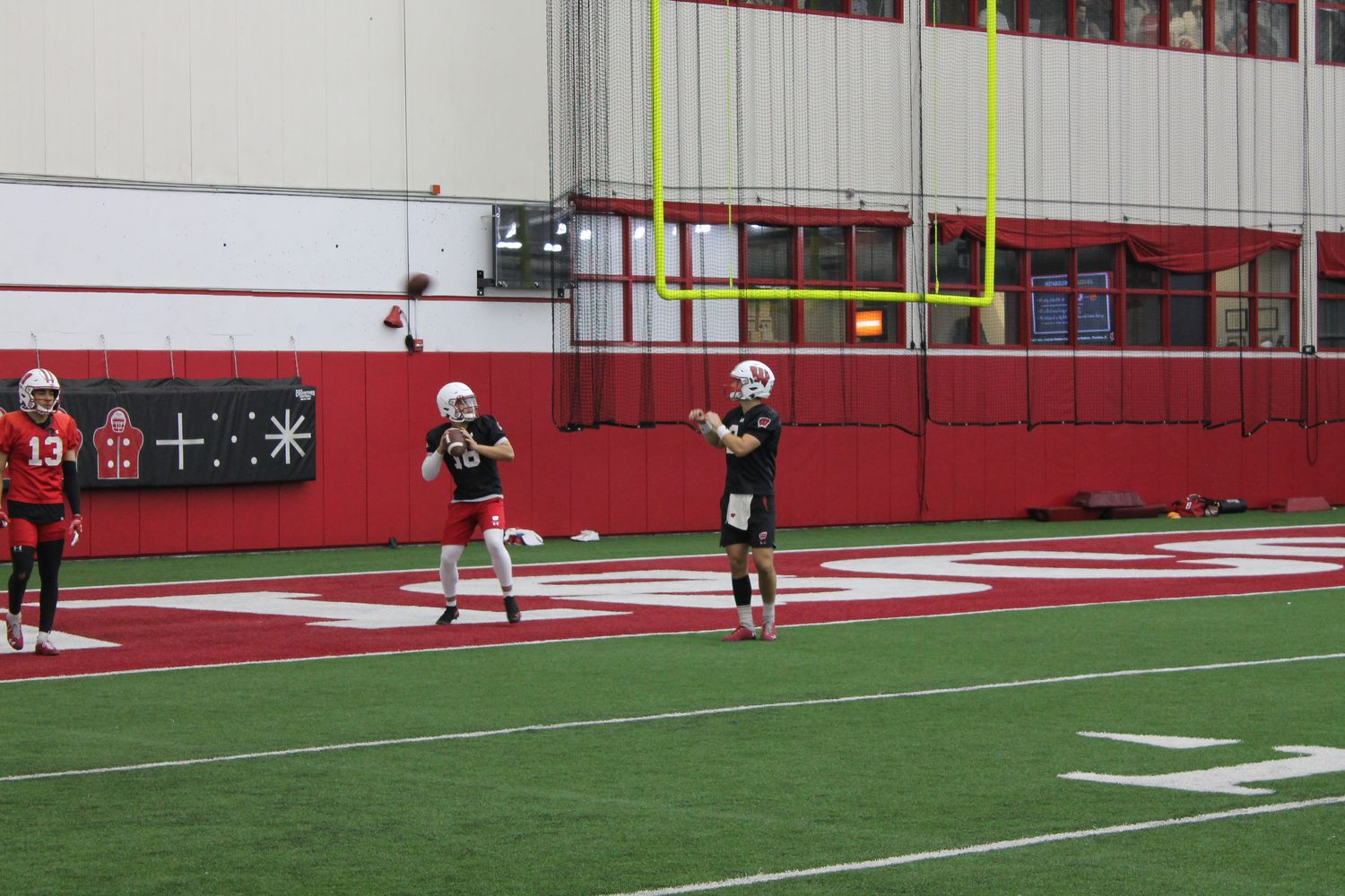True freshman quarterback Myles Burkett throwing in practice.