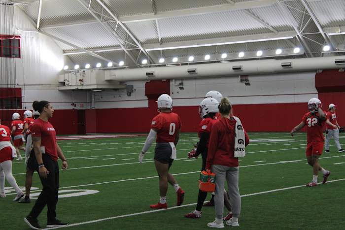 Starting running back Braelon Allen waits in line before running a route in practice.