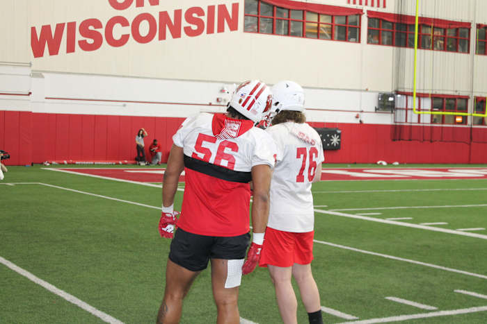 Wisconsin defensive linemen Tommy Brunner (No. 76) and Rodas Johnson *(No. 56)