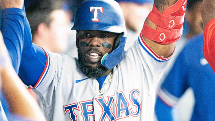 Apr 8, 2022; Toronto, Ontario, CAN; Texas Rangers center fielder Adolis Garcia (53) celebrates in the dugout after hitting a home run during the seventh inning against the Toronto Blue Jays at Rogers Centre . Mandatory Credit: Nick Turchiaro-USA TODAY Sports