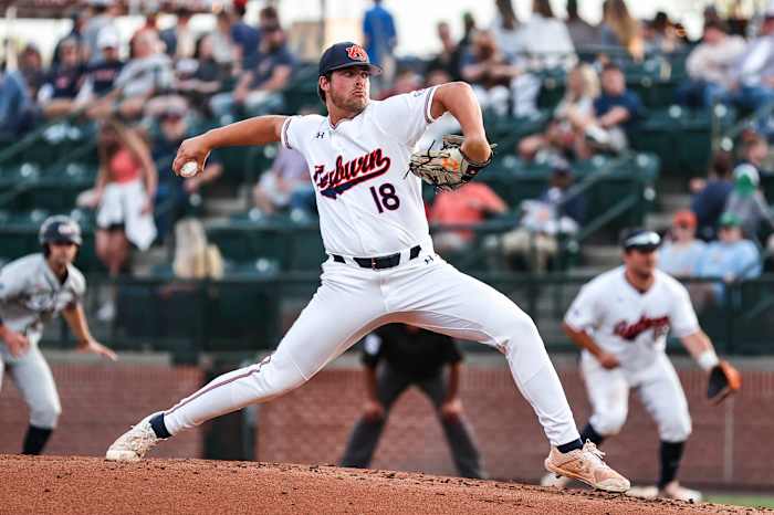 Mason Barnett throws a pitch for Auburn baseball against Samford.