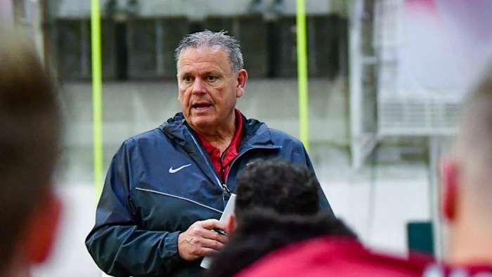 Arkansas coach Sam Pittman addresses the team during spring practices.