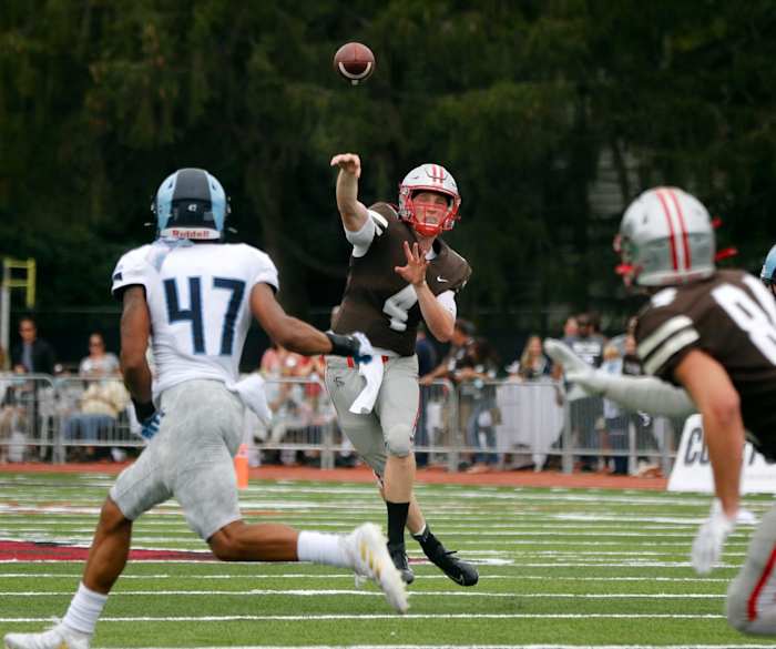 Brown QB EJ Perry throws to a receiver. Kris Craig/The Providence Journal / USA TODAY NETWORK