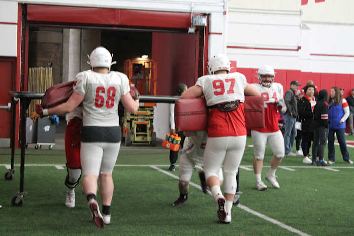 The Wisconsin defensive line working on individual drills during spring practice.