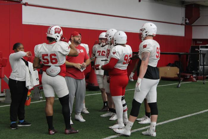 Ross Kolodziej speaking with the defensive line.