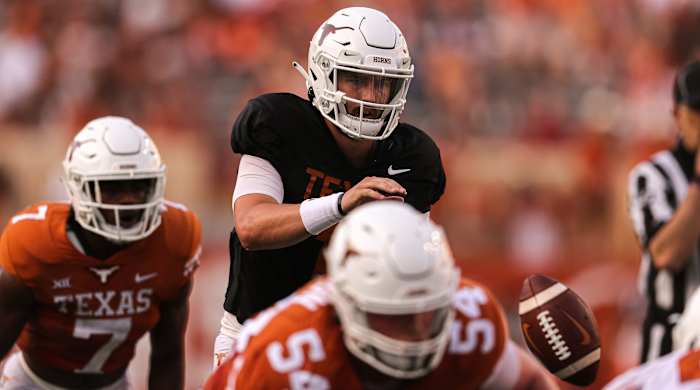 Hudson Card taking a snap at the Texas spring game