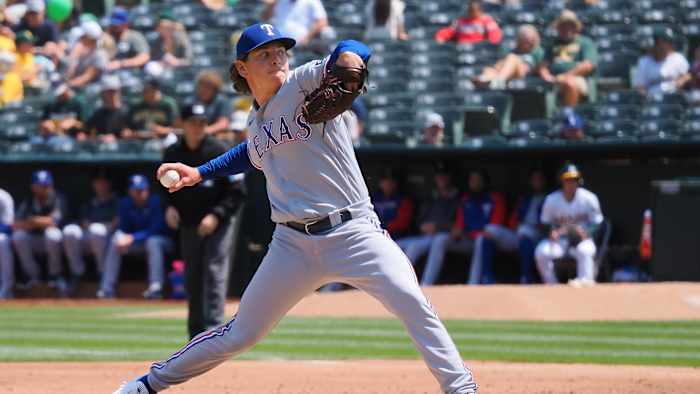 Apr 24, 2022; Oakland, California, USA; Texas Rangers relief pitcher Spencer Howard (31) pitches the ball against the Oakland Athletics during the third inning at RingCentral Coliseum. Mandatory Credit: Kelley L Cox-USA TODAY Sports