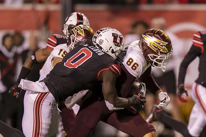 Utah linebacker Devin Lloyd (0) tackles Arizona State tight end Curtis Hodges (86). Mandatory Credit: Rob Gray-USA TODAY Sports