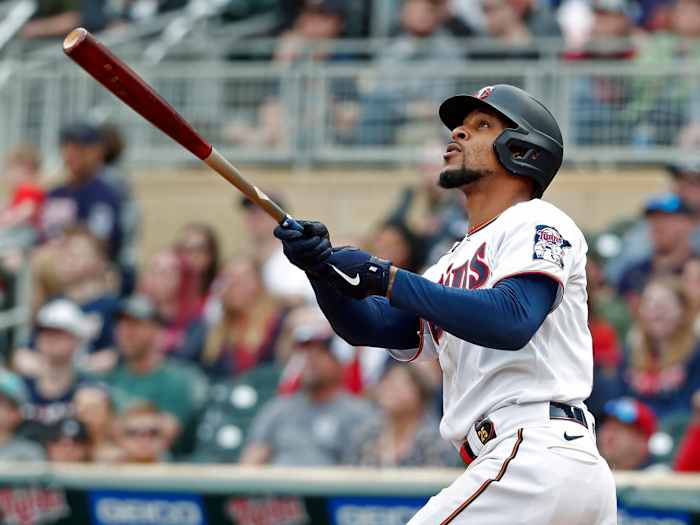 Minnesota Twins’ Byron Buxton watches a solo home run against the Chicago White Sox during the fourth inning of a baseball game Saturday, April 23, 2022, in Minneapolis. The Twins won 9-2.