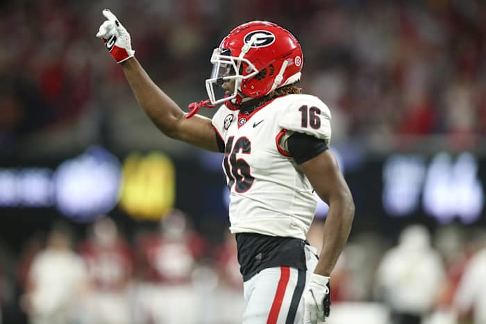 Dec 4, 2021; Atlanta, GA, USA; Georgia Bulldogs defensive back Lewis Cine (16) celebrates after a pass break-up against the Alabama Crimson Tide in the first half during the SEC championship game at Mercedes-Benz Stadium. Mandatory Credit: Brett Davis-USA TODAY Sports