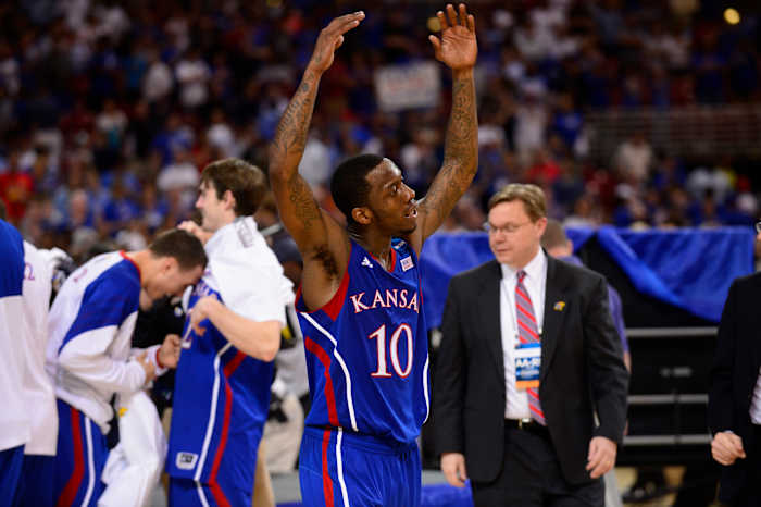 Mar 25, 2012; St. Louis, MO, USA; Kansas Jayhawks guard Tyshawn Taylor (10) reacts after the finals of the midwest region of the 2012 NCAA men's basketball tournament against the North Carolina Tar Heels at the Edward Jones Dome. Kansas won 80-67. Mandatory Credit: Scott Rovak-USA TODAY Sports