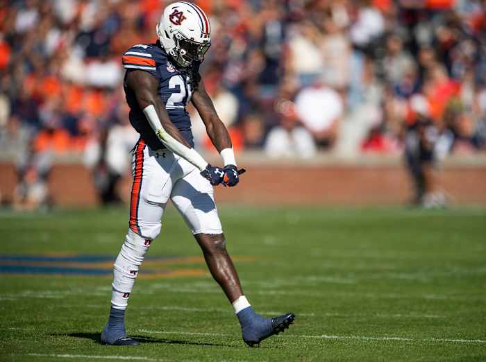 Auburn Tigers safety Smoke Monday (21) celebrates a pass breakup against Mississippi State at Jordan-Hare Stadium in Auburn, Ala., on Saturday, Nov. 13, 2021. Aumsu03