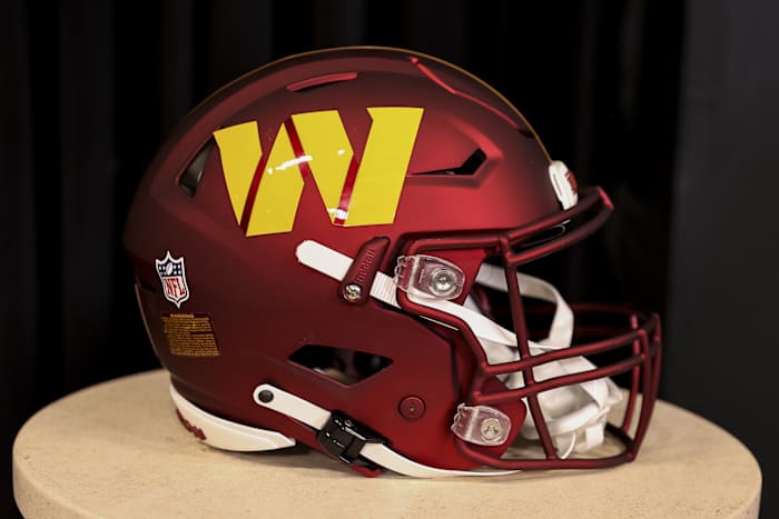 Mar 17, 2022; Ashburn, VA, USA; The helmet of Washington Commanders quarterback Carson Wentz sits on display for his introductory press conference at Inova Sports Performance Center Auditorium.