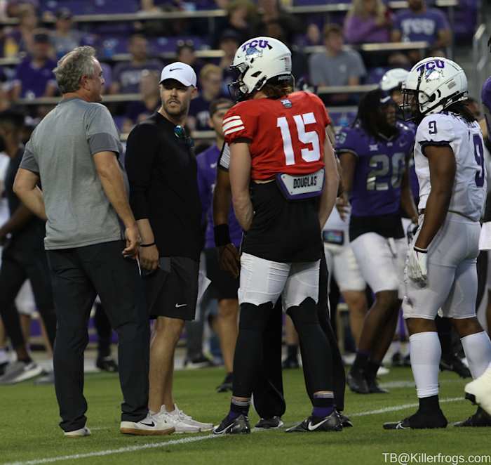 Head Coach Sonny Dykes and OC, Coach Riley, strategizing the offense during the Spring Game