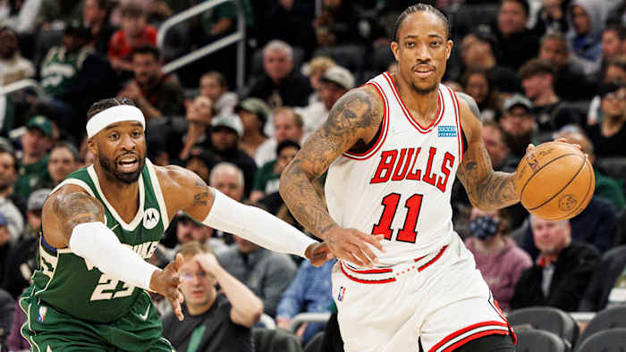 Chicago Bulls guard DeMar DeRozan (11) drives for the basket in front of Milwaukee Bucks guard Wesley Matthews (23) during the third quarter.