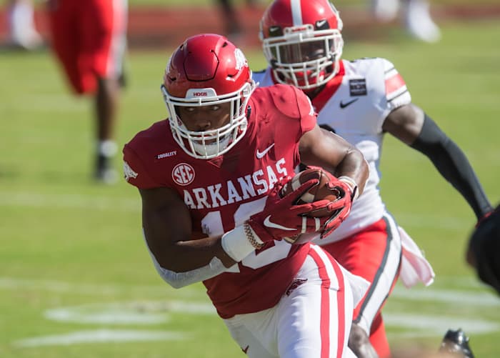 Arkansas Razorbacks wide receiver Treylon Burks (16) gets past Georgia Bulldogs defensive back Richard LeCounte (2) and goes on to score a touchdown during the first quarter at Donald W. Reynolds Razorback Stadium. Georgia won the game 37-10.