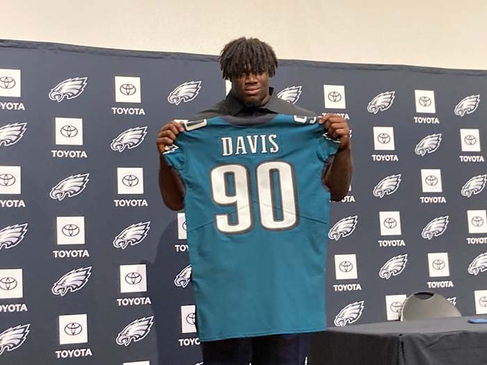 Jordan Davis displays his jersey after being picked 13th overall in the 2022 NFL Draft