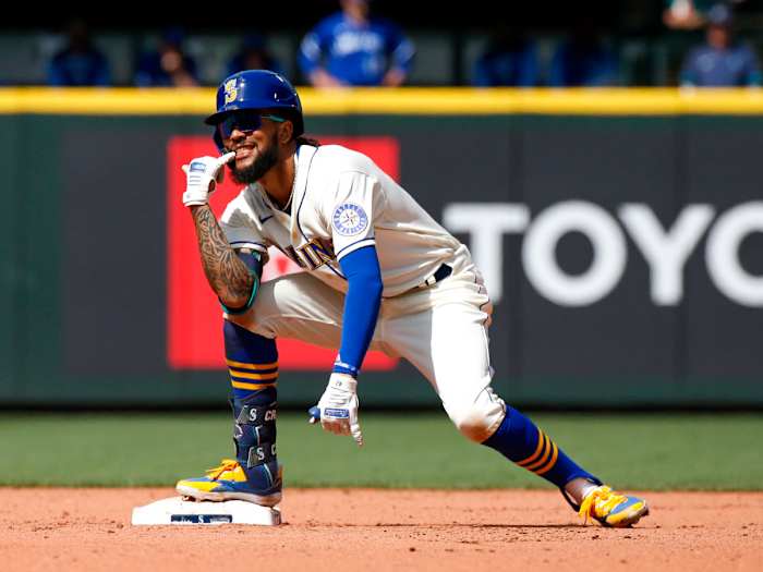 Apr 24, 2022; Seattle, Washington, USA; Seattle Mariners shortstop J.P. Crawford (3) reacts after hitting an RBI-double against the Kansas City Royals during the sixth inning at T-Mobile Park.