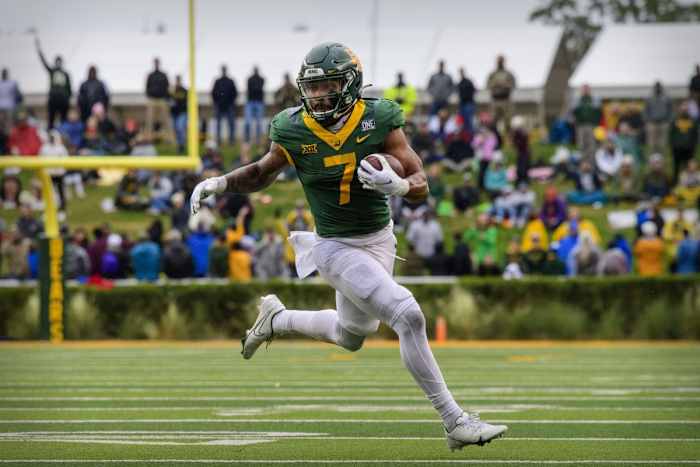Baylor Bears running back Abram Smith (7) runs against Texas Tech. Mandatory Credit: Jerome Miron-USA TODAY Sports
