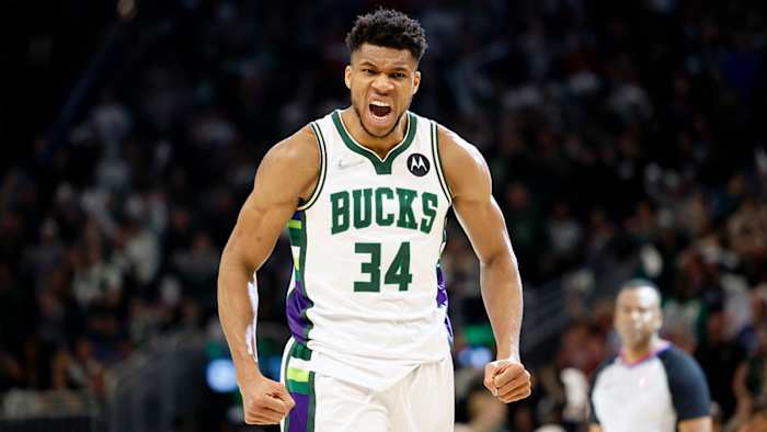 Milwaukee Bucks forward Giannis Antetokounmpo (34) reacts after scorring during the third quarter against the Boston Celtics.