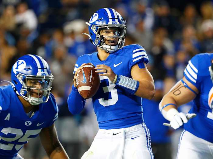 BYU quarterback Jaren Hall throws vs. Virginia