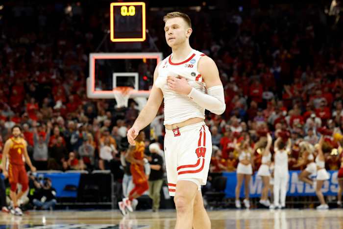 Wisconsin Badgers guard Brad Davison (34) reacts to the loss against the Iowa State Cyclones 54-49 in the second round of the 2022 NCAA Tournament at Fiserv Forum.