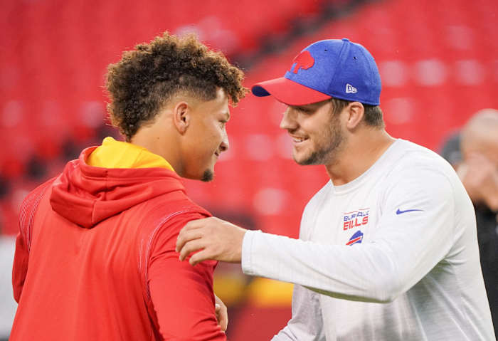 Oct 10, 2021; Kansas City, Missouri, USA; Kansas City Chiefs quarterback Patrick Mahomes (15) talks with Buffalo Bills quarterback Josh Allen (17) before warm ups at GEHA Field at Arrowhead Stadium. Mandatory Credit: Denny Medley-USA TODAY Sports
