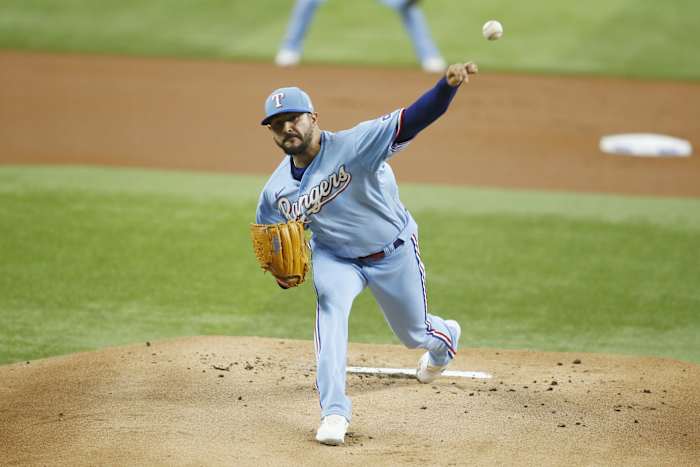 May 15, 2022; Arlington, Texas, USA; Texas Rangers starting pitcher Martin Perez #54 throws a pitch in the first inning against the Boston Red Sox at Globe Life Field.