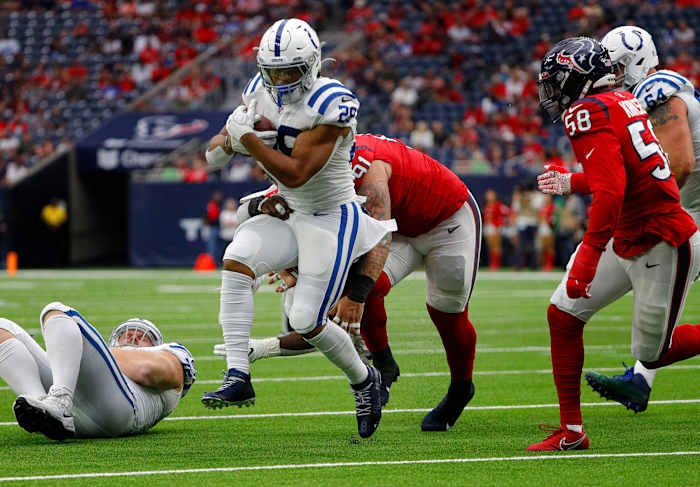 Indianapolis Colts running back Jonathan Taylor (28) runs the ball during the first quarter of the game Sunday, Dec. 5, 2021, at NRG Stadium in Houston. Indianapolis Colts Versus Houston Texans On Sunday Dec 5 2021 At Nrg Stadium In Houston Texas
