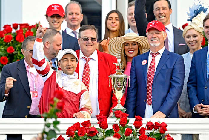 Owner Rick Dawson (right of trophy) joined forces with Eric Reed (left) in 2021.
